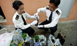 contrebande iphone chine bouteille de biere vignette